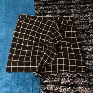 Brown and white plaid mini skirt with ruffles